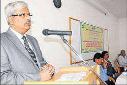creating awareness: District principal and sessions judge Mohan Sripad Sankolli addressing the participants of two day workshop at JSS law college in Mysore on Friday. Principal of college K S&#8200;Suresh, Principle civil judge of senior grade B Nandakumar and deputy director of women and child welfare department N R&#8200;Vijay are seen. dh photo