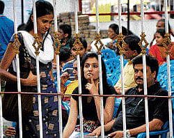 Future tense:  Students wait with their parents to get their documents verified at the  CET Cell in Bangalore on Friday. dh photo