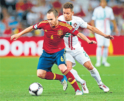 THE ILLUSIONIST:&#8200;Andres Iniesta (No 6) goes about his business in a quiet but  effective way. AFP