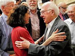 great discovery: British physicist Peter Higgs congratulates Fabiola Gianotti, the coordinator and spokesperson of the ATLAS experiment, after her presentation at a news conference at the European Centre for Nuclear Research headquarters in Geneva on Thursday. NYT