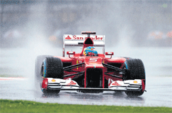 red hot: Fernando Alonso claimed pole in the qualifying session for the British GP. AFP