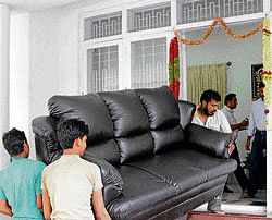 New furniture arrive at Jagadish Shettars house in  Bangalore on Monday. DH Photo