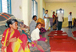 Stopgap arrangement: Inmates at the temporary shelter at the Samudaya Bhavana in Jamboo Savari Dinne, Anjanapura. dh Photo