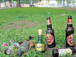 Alcohol bottles scattered in Mahatma Gandhi park.