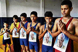 Remembering the titan: Young wrestlers pay tribute to Dara Singh in Moradabad on Thursday. PTI