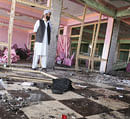 A man stands at the site of attack in Samangan province July 14, 2012. A suicide bomber blew himself up at a wedding reception in northern Afghanistan on Saturday, killing at least 22 people including a prominent politician, and wounding 40 others, police said. REUTERS Photo