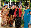 Teachers leave after a school in Bangalore declared closure on Monday. DH Photo