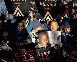 14 m kids greet Mandela at 94