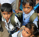 These first standard students took admission under RTE in a private school at Nandini Layout, but school administration chopped their little hair to easy identify and made them to sit in last row, these children came to Press Club with 'Dalit Samrajya Sthapana Samiti members to tell about this and many other problems they are facing in school, in Bangalore. DHNS Photo