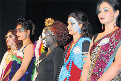 creative The models displaying different hair styles and make-up .