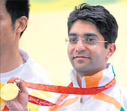 prized possession: Abhinav Bindra with his gold medal in 2008. dh photo/ k n Shanth kumar