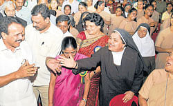 Smiling faces: Faculty of Teresian College greet former chief minister D&#8200;V&#8200;Sadananda Gowda in Mysore on Monday.