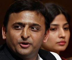 Uttar Pradesh Chief Minister Akhilesh Yadav and his wife MP Dimple Yadav at an interactive session organised by FICCI-YFLO in New Delhi on Tuesday. PTI