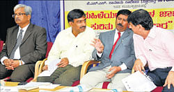 Talk: Principal civil judge B Nandakumar shares a word with JSS Law College principal K&#8200;S&#8200;Suresh and deputy commissioner P&#8200;S&#8200;Vastrad in Mysore on Wednesday. Principal district and sessions court judge Mohan S&#8200;Sankolli is seen. dh photo