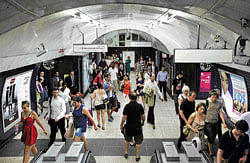 ready for the hustle and bustle: A scene at a London tube which is the lifeline of the capitals transport system. AFP