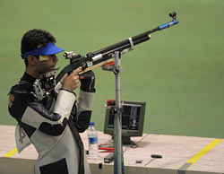 Abhinav Bindra prepares to fire during the men's 10m air rifle qualifing round shooting. AFP file photo