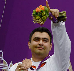 India's Gagan Narang competes in the qualification round of 10m Air Rifle shooting event at the Olympic Games 2012 in London on Monday. PTI Photo by Manvender Vashist