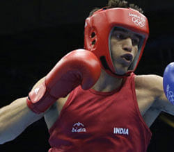 India's Sumit Sangwan fights Brazil's Yamaguchi Falcao during their men's light heavyweight 81-kg boxing match at the 2012 Summer Olympics, Monday, July 30, 2012, in London. (AP