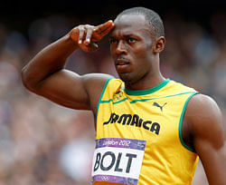 Jamaica's Usain Bolt salutes before his men's 200m round 1 heat at the London 2012 Olympic Games at the Olympic Stadium August 7, 2012. REUTERS
