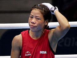 A disappointed MC Mary Kom after losing to Nicola Adams of Great Britain in the semi-final of women's Flyweight boxing at Olympic Games in London on Wednesday. PTI