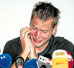 tears of sin Italys Alex Schwazer cries while addressing a press conference at Bolzano, Italy, on Wednesday. AFP