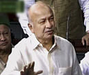 Leader of House and Home Minister Sushilkumar Shinde speaks in the Lok Sabha on the first day of Parliament's monsoon session in New Delhi on Wednesday. PTI