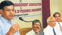 SKDRDP Executive Director Dr L H Manjunath speaks on Rural Management in Mangalore.