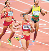 i did it: Allyson Felix is over the moon after winning the 200M race. dh photo/ K N Shanth Kumar