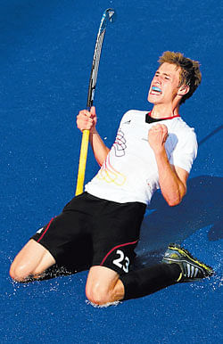 class apart: Germanys Florian Fuchs celebrates after scoring against Australia in the semifinals of the hockey event. AP