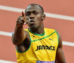 Jamaica's Usain Bolt celebrates after winning the men's 200m final at the athletics event during the London 2012 Olympic Games on August 9, 2012 in London. AFP