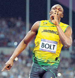 Usain Bolt celebrates after winning the men's 200m final. AFP