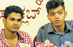 Morning Mist homestay victims Vijaykumar (left) and Gurudatt Kamath addressing a press conference at Press Club in Mangalore on Saturday. DH photo