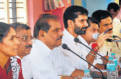 District in-Charge Minister C T Ravi speaks at the review meeting of development work at Belthangady Taluk Panchayat on Monday. MLA Vasanth Bangera, DC Dr N S Channappa Gowda, ZP CEO Dr Vijayaprakash among others look on. DH Photo