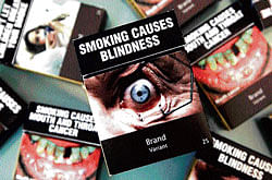 kicking the habit: Brand logos and colourful designs will be banned, with only a small space remaining where the brand name and variant of the cigarette can be printed.