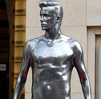 A statue of English soccer player David Beckham is shown in the Hollywood section of Los Angeles Friday, Aug. 17, 2012. Beckham, sporting designer underwear, is making appearances around New York City, Los Angeles and San Francisco, in the form of 10-foot-tall metallic statues, that is. (AP Photo