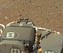 The view shows the gravelly Martian surface Surrounding Curiosity. AFP