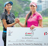 CHAMP: The Womens Pro golf tournament winner Sharmila Nicollet (right) is  congratulated by Aditi&#8200;Ashok (best amateur) at the KGA course on Friday. DH PHOTO