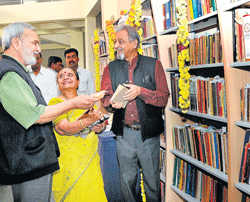 Jnanpith awardee U R Ananthamurthy at the Indira Gandhi National Centre for the Arts library on Monday. The centres honorary director S Shettar is with him. DH Photo
