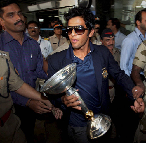 Under-19 Team India captain Unmukt Chand on his arrival at the airport in Mumbai on Tuesday. PTI Photo by Shirish Shete