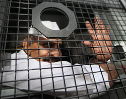 Mumbai: Gangster-turned-politician Arun Gawli is taken to jail in a police vehicle after he was sentenced to life term in the murder case of Shiv Sena corporator Kamlakar Jamsandekar in Mumbai on Friday. PTI Photo