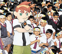 happy lot The students interacting with Ben 10.