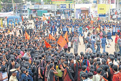 College students under the aegis of ABVP and YAS stage a protest in Chikmagalur on Tuesday.