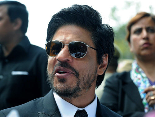 Indian Bollywood film actor Shah Rukh Khan speaks during a press conference in Srinagar on September 6, 2012. AFP PHOTO/Rouf BHAT
