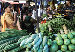 People buying vegetables in Central market on Friday on the eve of Krishna Janmashtami and 'Monti Fest' (Nativity of Blessed Virgin Mary) which will be celebrated on Saturday.