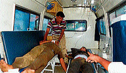 The bus driver and conductor who allegedly consumed poison being shifted in an ambulance from K&#8200;R Pet in Mandya district on Monday. dh photo