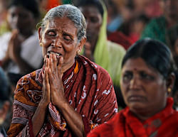 A woman reacts during a protest against the Russian-built Kudankulam Atomic Power Project, near the project site in the southern Indian state of Tamil Nadu, Tuesday, Sept. 11, 2012. State officials said Indian police fired at protesters near the plant being constructed, killing one person. Construction of the plant has been delayed by protests in the past year by residents and anti-nuclear groups concerned about safety following the Fukushima nuclear power plant disaster in Japan last year. AP