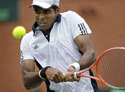 India's Vishnu Vardhan plays against New Zealand's Jose (Rubin) Statham, unseen, during their Davis Cup tennis match in Chandigarh, on Saturday. AP