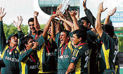 on cloud nine: Pakistani players pose with the 2009 World T20 trophy. DH&#8200;FILE PHOTO
