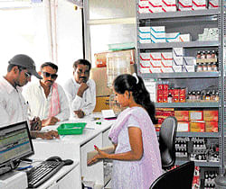 Generic drugs:  A girl sells generic drugs at a  shop. Dh photo