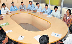 Students participate in group discussion by the Indian Navy as part of the recruitment process at National Institute of Engineering in Mysore on Saturday. DH photo